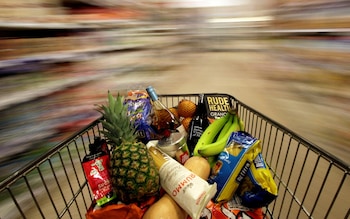FILE PHOTO: A shopping trolley is pushed around a supermarket in London, Britain May 19, 2015. REUTERS/Stefan Wermuth/File Photo


