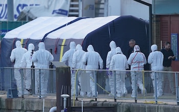 Police Forensic officers at the RNLI station at the Port of Dover after a large search and rescue operation in the Channel. At least four migrants died
