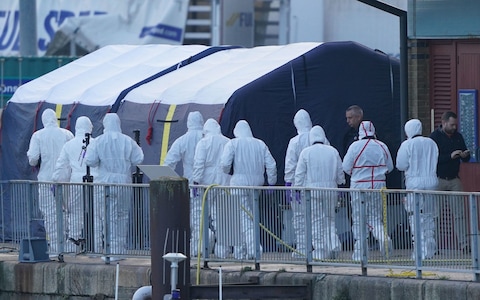 Police forensic officers after the incident in the Channel, in which four people drowned