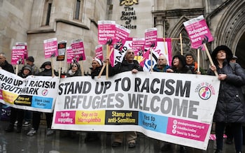 Members of the Stand up to Racism protest group demonstrate against the deportations of Refugees to Rwanda at the High Court in London, Britain 19 December 2022