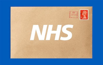 An envelope with "NHS" written on it