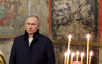 Vladimir Putin attends the Orthodox Christmas service at the Kremlin in Moscow