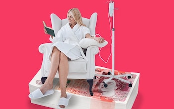 woman with drip sat on pile of cash